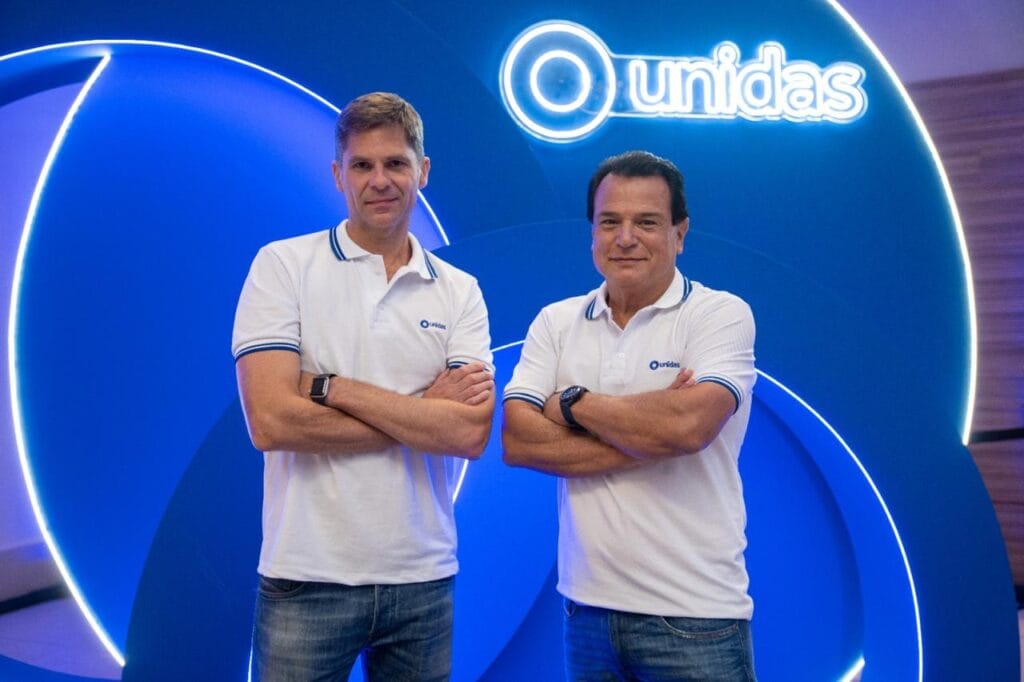 Unidas salta de R$ 500 milhões para quase R$ 7 bilhões. Mesmo assim, muda de direção 1 | Brazil Economy Carlos Augusto Moreira (à esq.), ex-CFO, assume o volante da companhia no lugar de Claudio Zattar, que sobe para o conselho