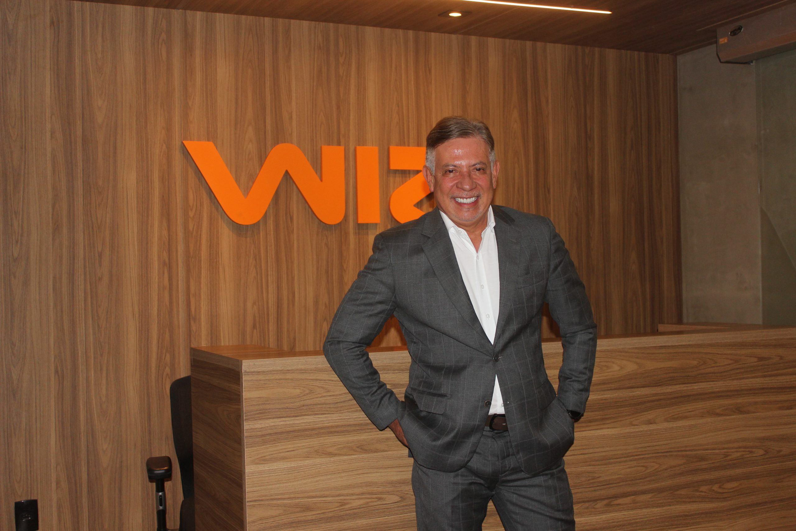 Marcus Vinicius de Oliveira, CEO da Wiz, diz que riscos climáticos pesam mais sobre o negócio do que a Selic